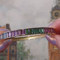 18 karaat gouden armband met citrien, granaat, toermalijn en blauwe topaas.