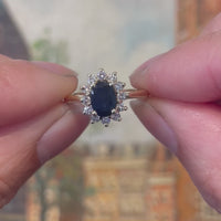Sapphire and diamond cluster ring in 14 carat gold