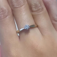 Diamond solitaire ring in 14 carat gold