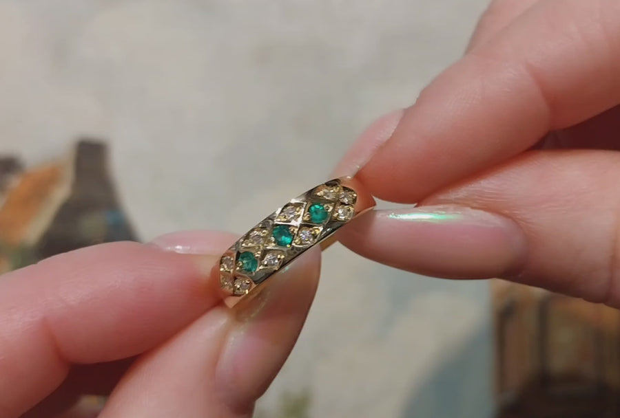 Emerald and diamond 18 carat gold ring