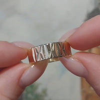 14 carat gold band with motif