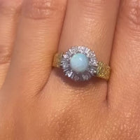 Opal and diamond ring in 18 carat gold