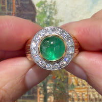 Emerald and diamond ring in 14 carat gold