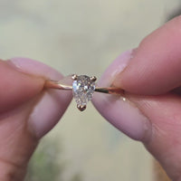 Pear cut diamond solitaire ring in 18 carat gold