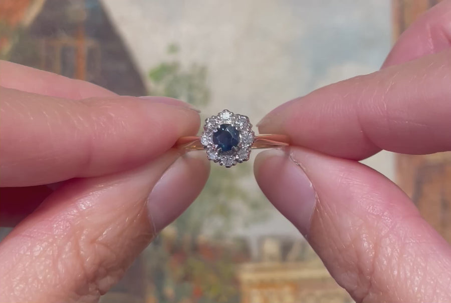 Goud en platina ring met saffier en diamant