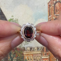 Garnet and diamond ring in 14 carat gold
