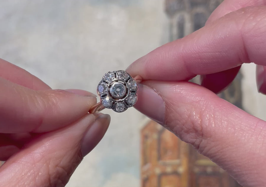 Old cut diamond cluster ring in silver and gold
