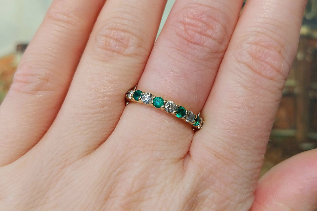 Emerald and diamond band in 18 carat gold