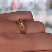 Arch style ring with half cut diamonds in 14 carat gold