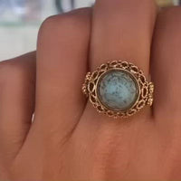 Cabochon turquoise ring in 14 carat yellow gold