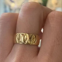 1960's 22 carat gold band with motief